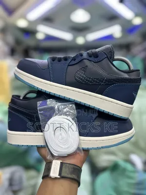 Nike Air Jordan 1 Low SE 'Black Dark Obsidian Snakeskin'.