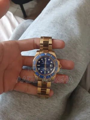 Rolex Submariner Date "Bluesy" -- Two - Tone Gold and Steel