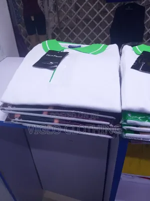 White Body Green Collar Poloshirts in Wholesale and Single Orders