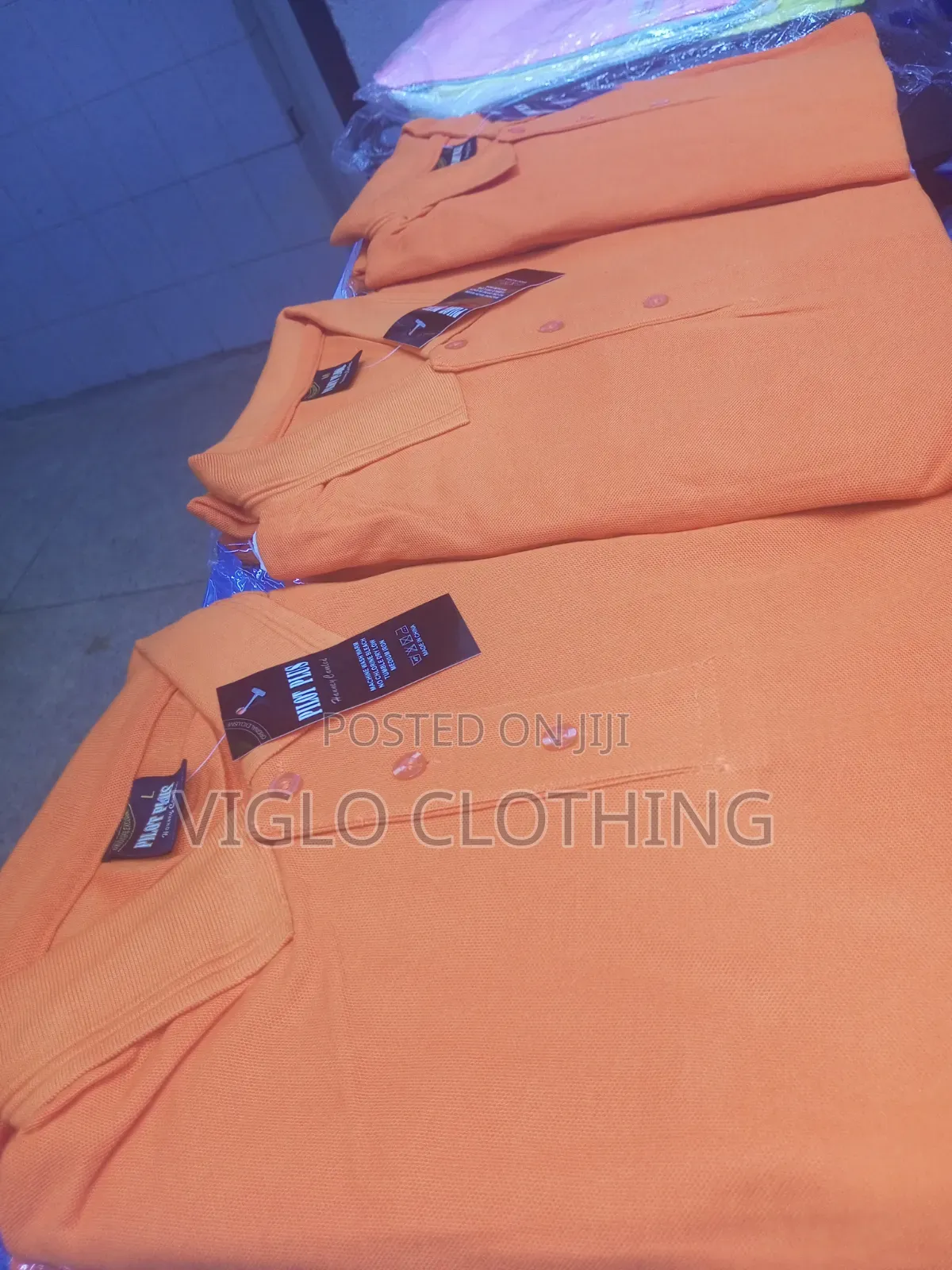 Orange Poloshirts in Wholesale and Single Orders