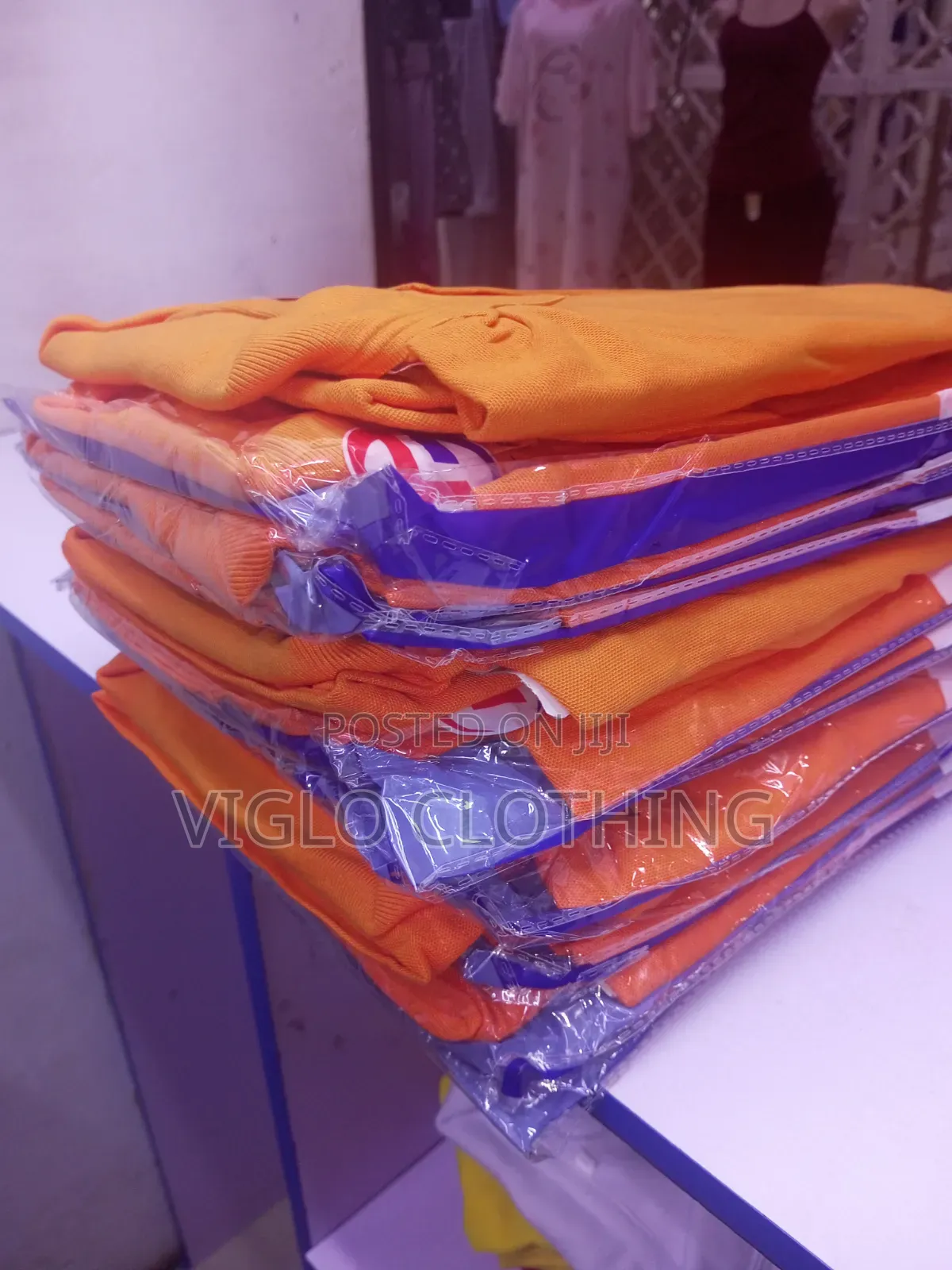Orange Poloshirts in Wholesale and Single Orders