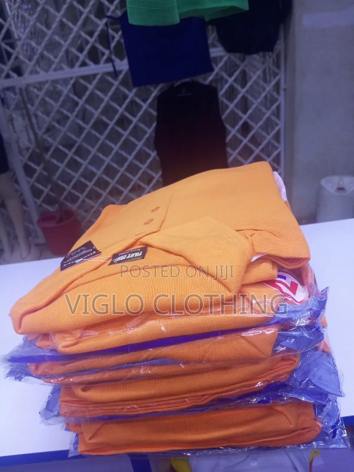 Orange Poloshirts in Wholesale and Single Orders