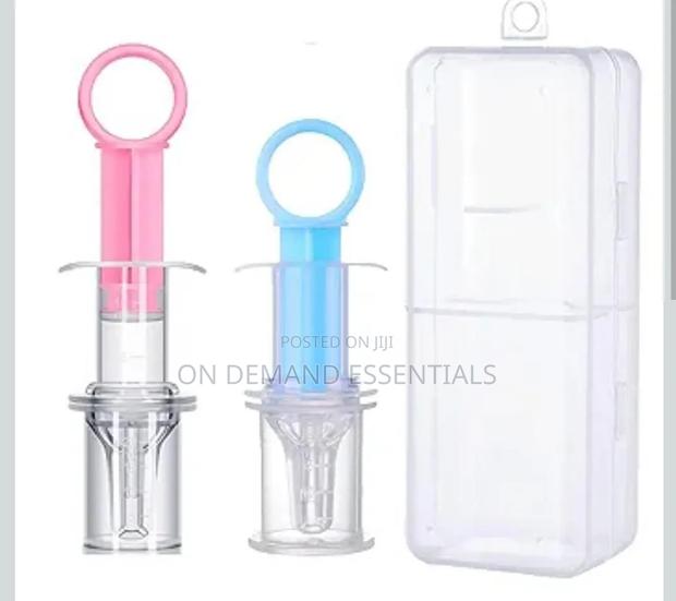 Baby Medicine Dispenser + 1 Piece Box