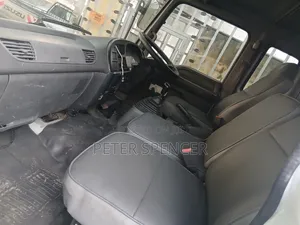 Isuzu FRR, 10tonnes, Cover Board