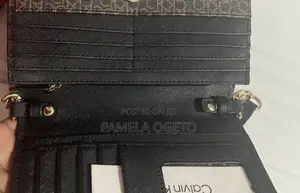 Authentic Calvin Klein Monogram Shoulder Bag -Brown