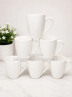 A Set of 6 White Mugs