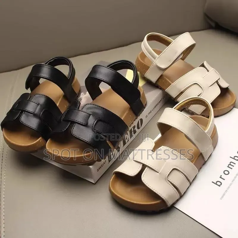 Kids' Modern Sandals. Sizes 26-36. Available in Cream and Black.