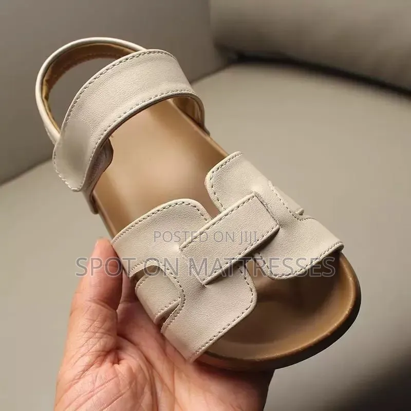 Kids' Modern Sandals. Sizes 26-36. Available in Cream and Black.