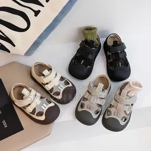 Cool Sandals for Kids! Available in Cream White and Black. Size 21-30.