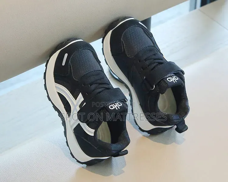 Children Sneakers in Colours White and Black. Delivery Available.
