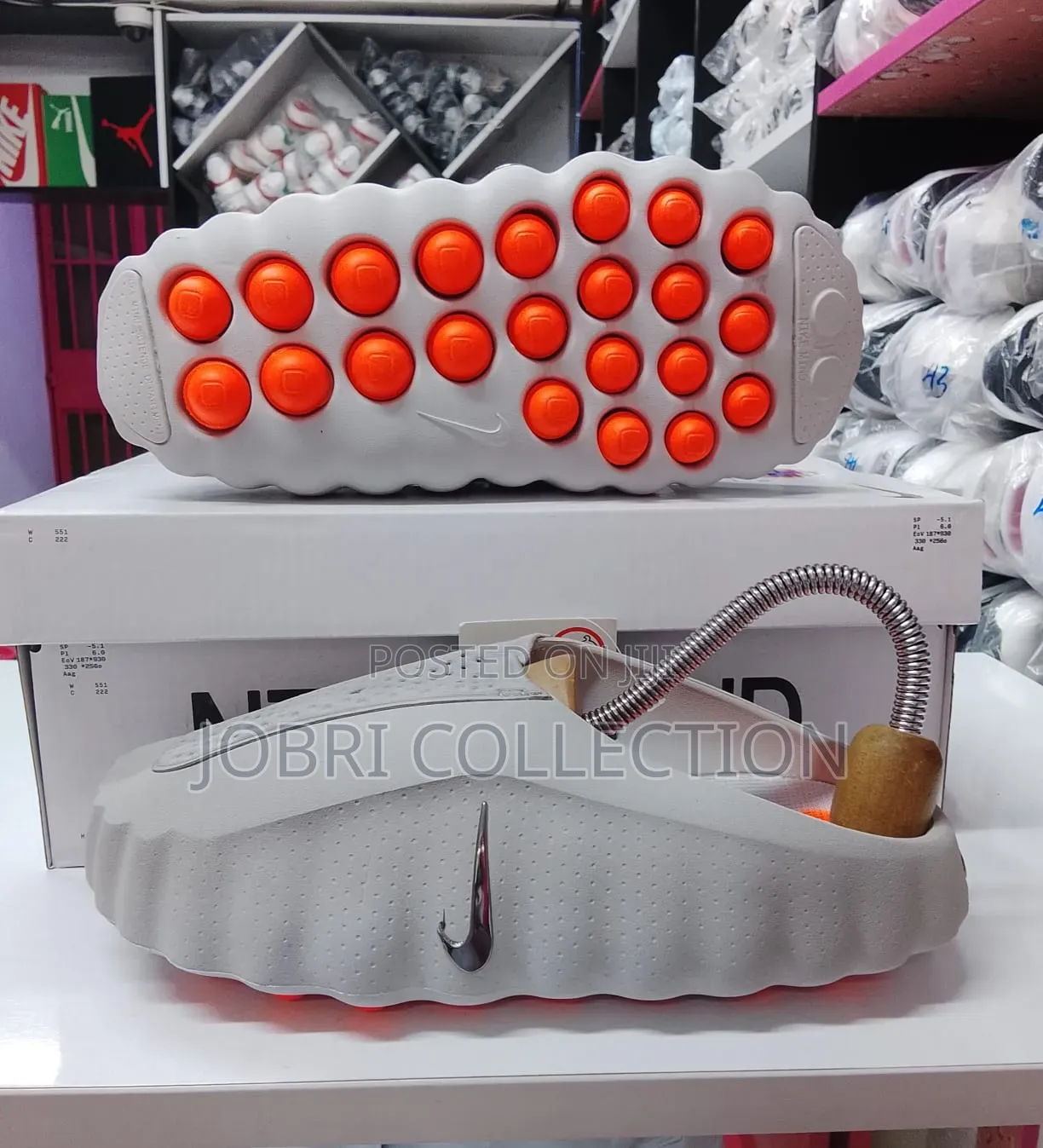 Nike Mind 001 LT Smoke Grey Chrome
Slides