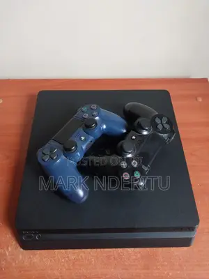 PlayStation 4 Slim 1TB – Mint Condition + Games Speakers