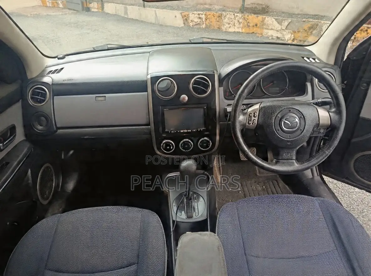 Mazda Verisa 2011 Maroon