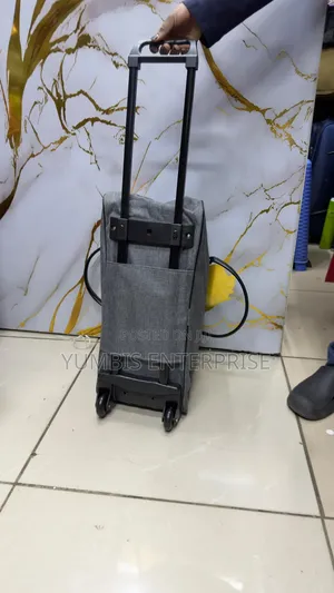 Grey Duffle Bags With Trolley Wheels