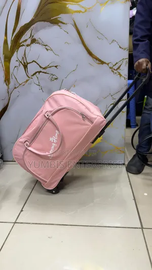 Pink Trolley Travel Bags With Wheels Size 54cm by 33cm
