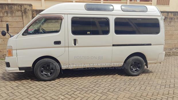 Nissan Caravan (Urvan) 2010 White - thumbnail 2
