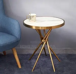 Round Table: Marble Dining Table With Flared Gold Legs