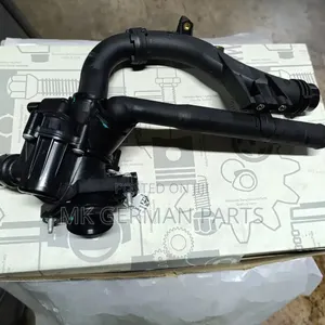 Genuine Coolant Thermostat Housing M274 Engine.