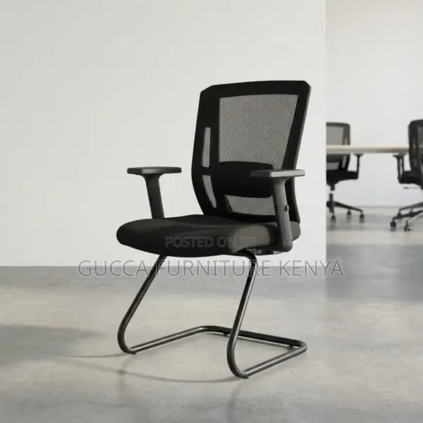 Ergonomic Mesh Guest Chair With Adjustable Arms.