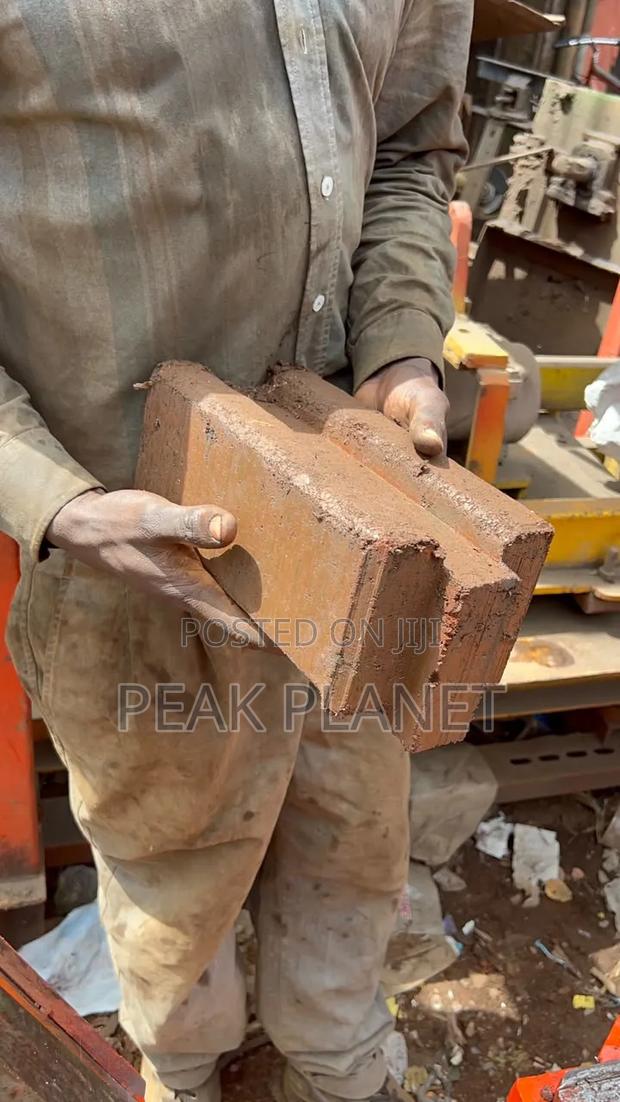 Manual Double Interlocking Brick Press Machine