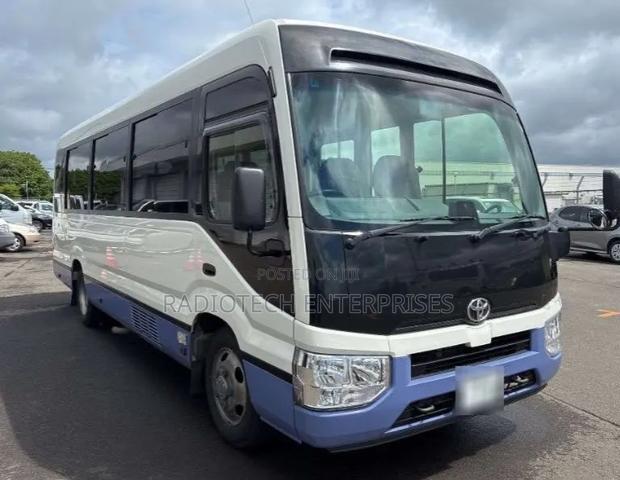 Toyota Coaster 2019 White - thumbnail 2