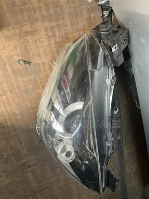 Mazda Demio Headlight (DB)