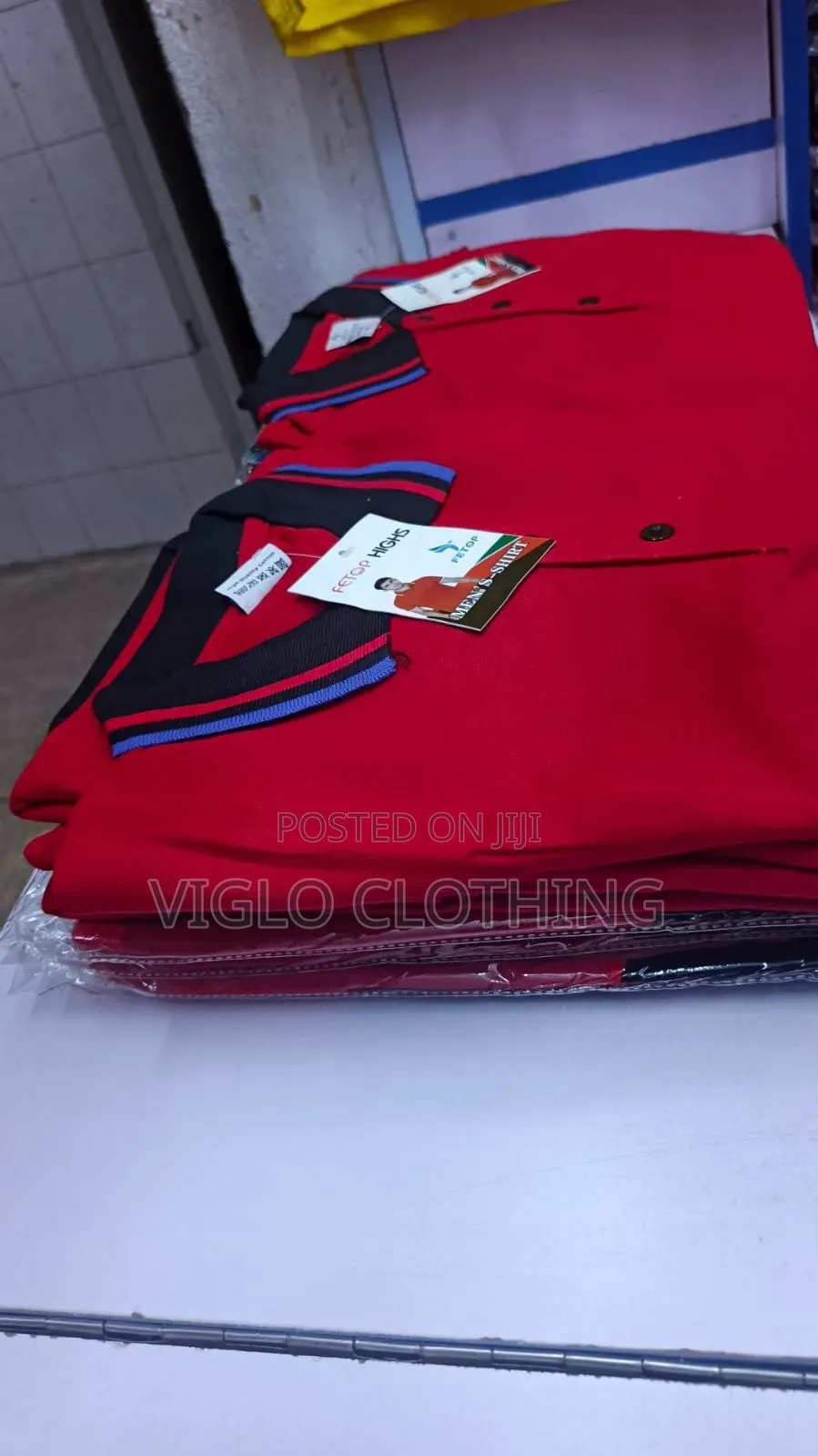 Red Body Black Collar Poloshirts Available in Wholesale and Singles