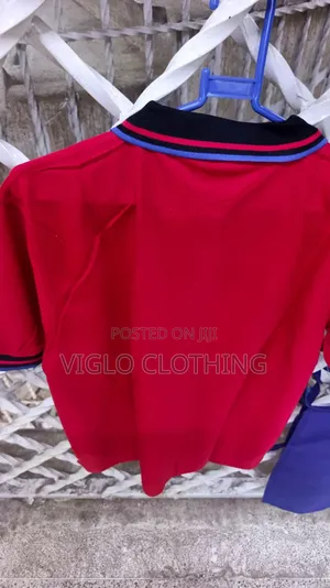 Red Body Black Collar Poloshirts Available in Wholesale and Singles