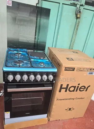 Haier 50×60 Freestanding Cooker – 3 Gas Burners, Electric Plate Oven