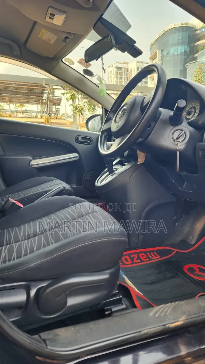 Mazda Demio 2009 Brown