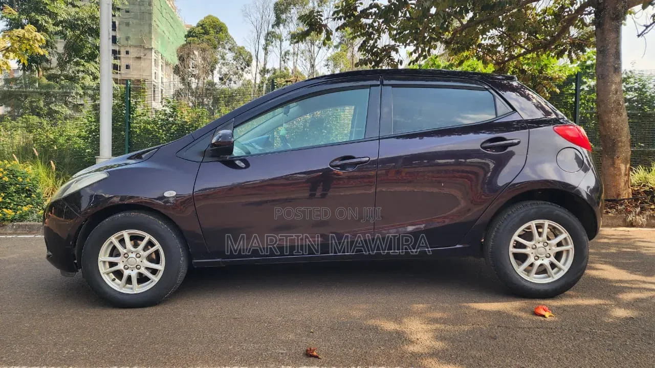 Mazda Demio 2009 Brown