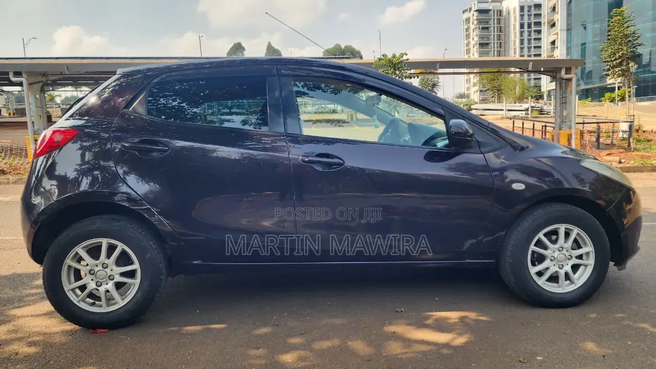 Mazda Demio 2009 Brown