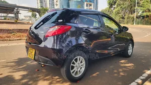 Mazda Demio 2009 Brown