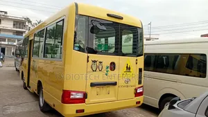 Toyota Coaster 2019 Yellow