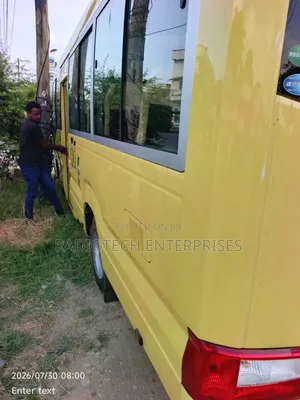 Toyota Coaster 2019 Yellow