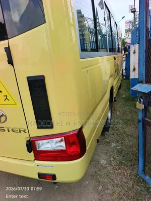 Toyota Coaster 2019 Yellow