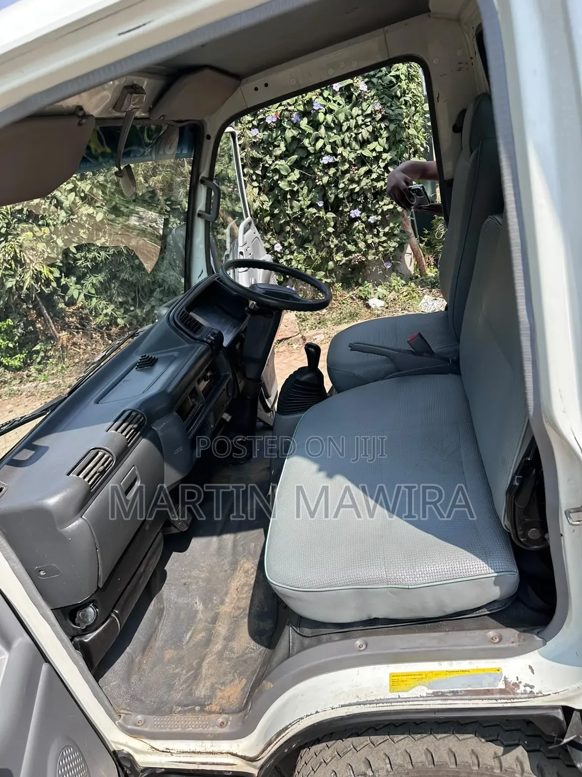 Covered Isuzu NKR