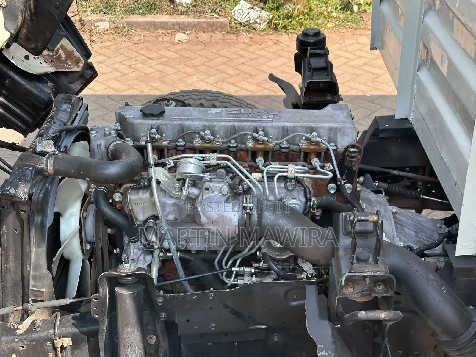 Covered Isuzu NKR