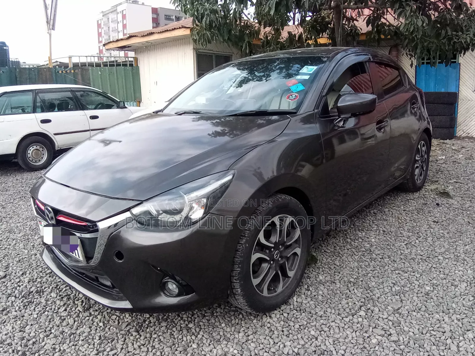 Mazda Demio 2015 Brown