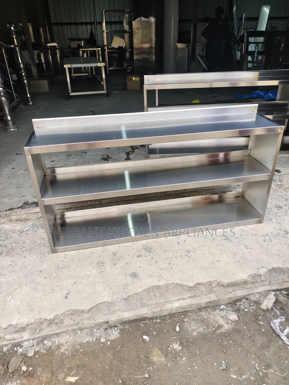 Stainless Steel Three‐Tier Wall Shelf