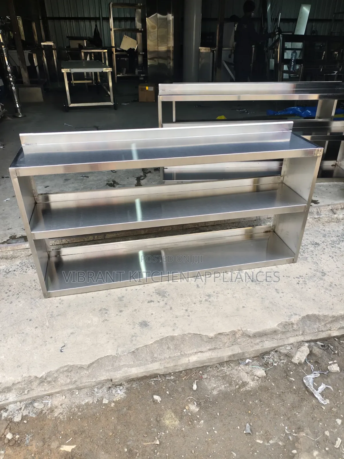 Stainless Steel Three‐Tier Wall Shelf