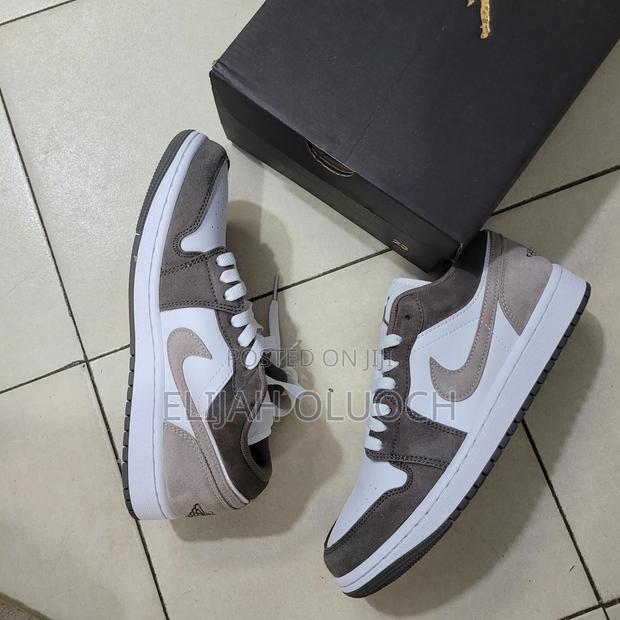 Nike Air Jordan 1 Low Sneakers in the "Olive Grey" Colorway,
