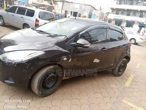 Mazda Demio 2012 Maroon