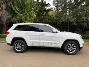 Jeep Grand Cherokee Laredo 4dr SUV 4WD (3.6L 6cyl 8A) 2015 White