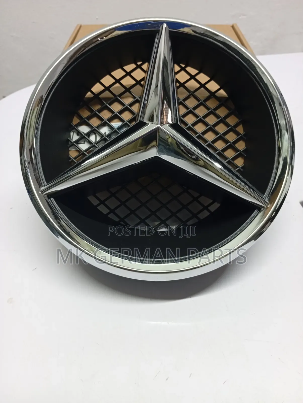 Genuine Mercedes Grille Star.