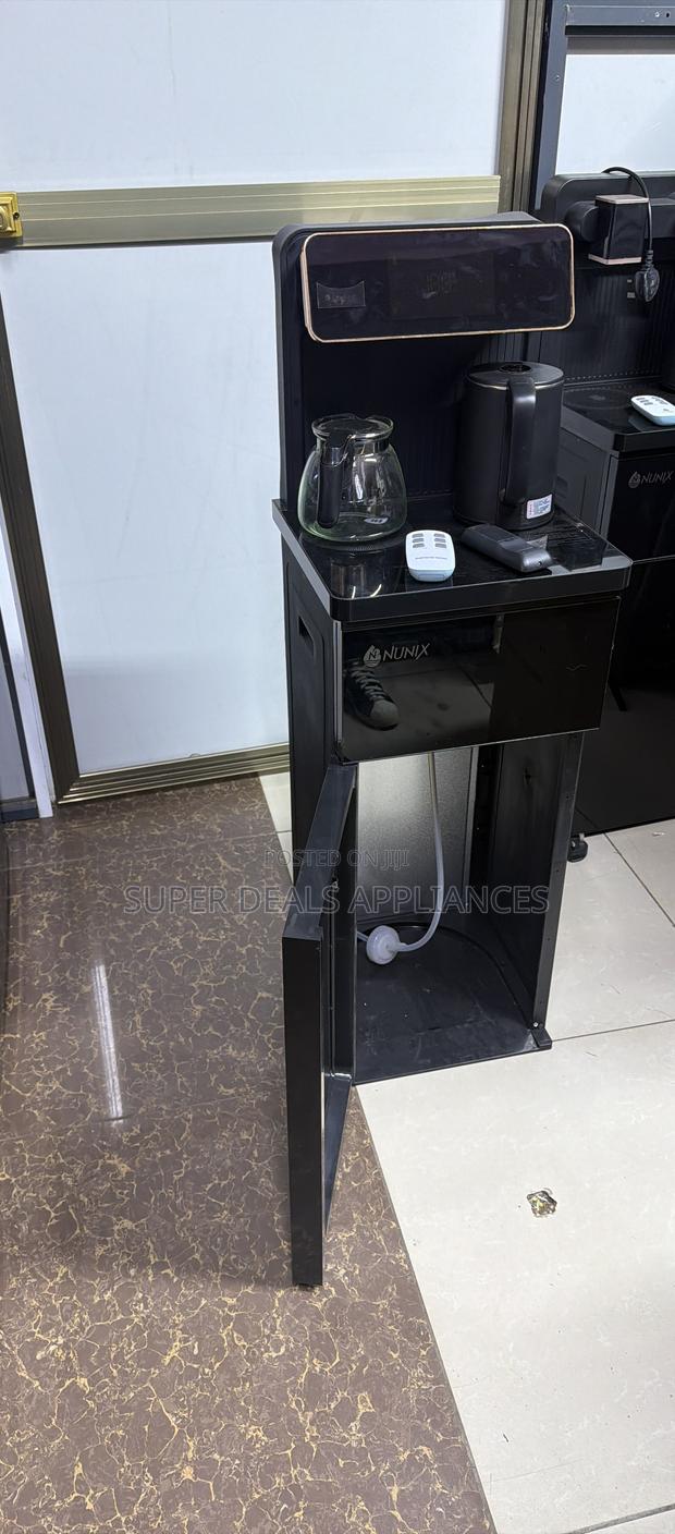 Nunix Bottom Load Dispenser With a Music System