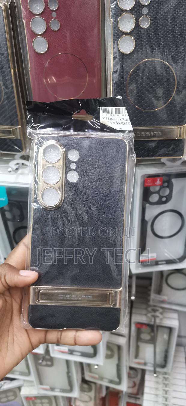 Black Textured Leather Phone Case With an Electroplated Gold Camera - main view