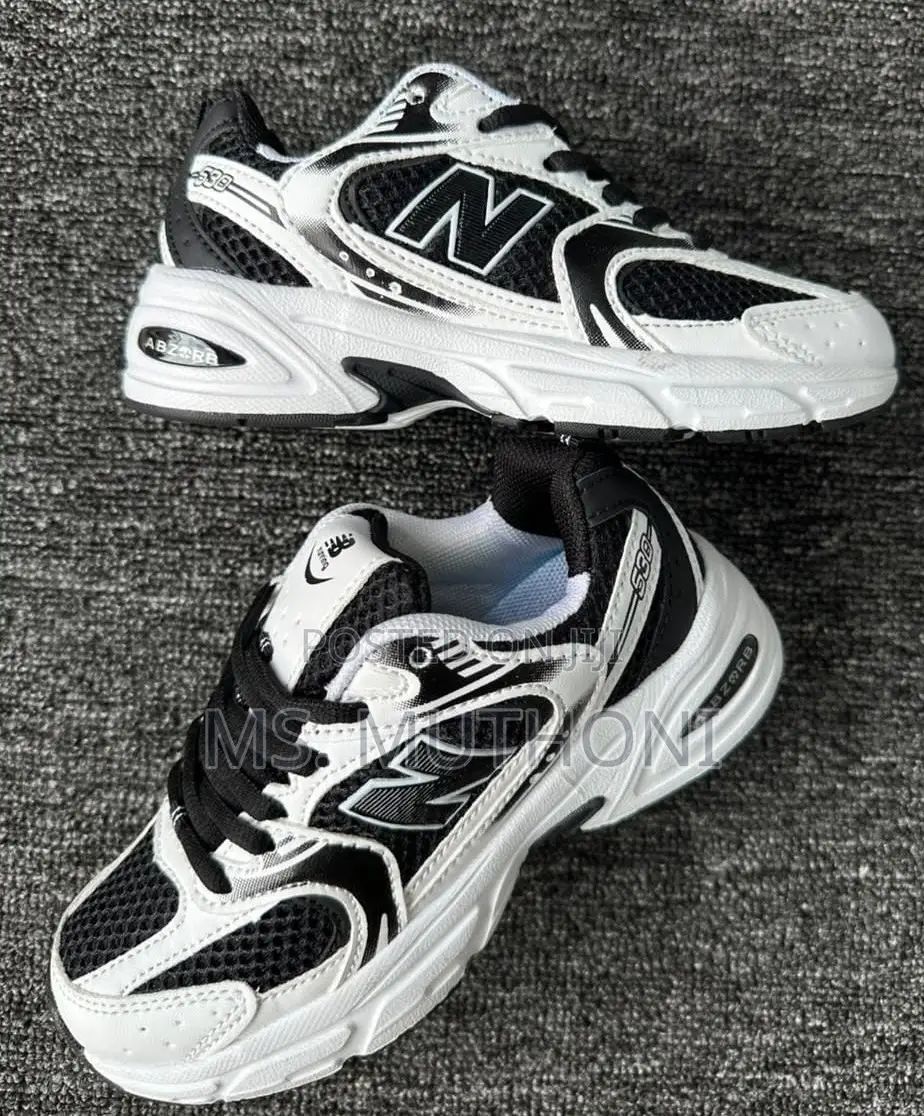 Size 31-35 Kids Black-and-White N. B 530 Kicks