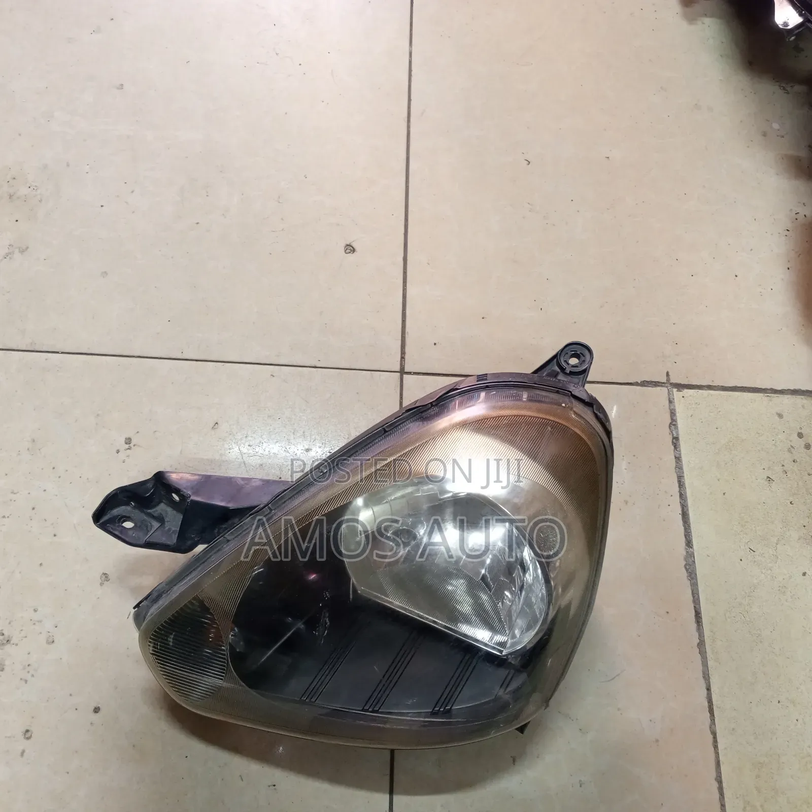 Daihatsu Mira 2012 Headlight