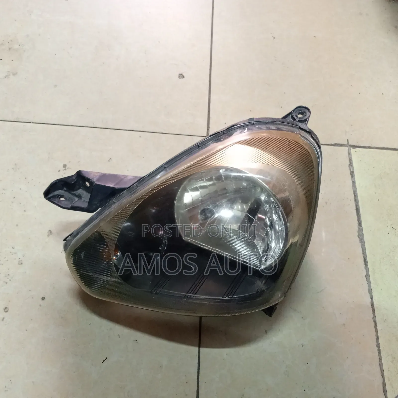 Daihatsu Mira 2012 Headlight